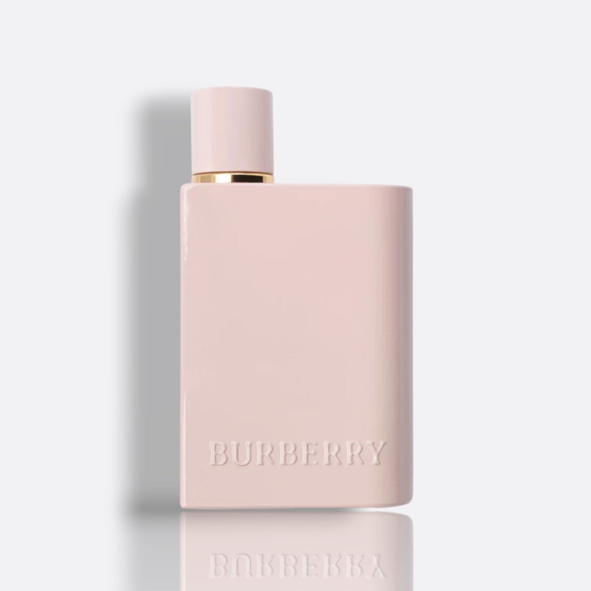 Her Elixir de Parfum bottle – bold women’s fragrance with fruity, floral, and warm gourmand notes