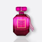 Victoria's Secret Bombshell Passion fragrance bottle - a vibrant and seductive women's perfume.
